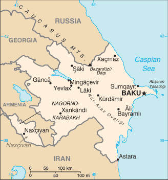 Azerbaijan.  The disputed enclaves are Nagorno-Karabakh in mid-Azerbaijan, and Nakhchivan (Naxivan), in the southwest corner of the map, separated from the rest of Azerbaijan by Armenian territory.  Not shown on the map, Turkey has a 10 km border with Nakhchivan. (CIA World Factbook)