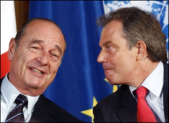 Tony Blair scowls angrily at grinning Jacques Chirac at Élysée Palace in Paris on Tuesday. <font size=-2>(Source: AP)</font>