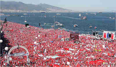 Over a million secularist demonstrators wave national flags during anti-Islamist rally in Izmir <font size=-2>(Source: IHT)</font>