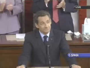 Sarkozy enjoys a standing ovation after praising American idealism <font face=Arial size=-2>(Source: C-SPAN)</font>