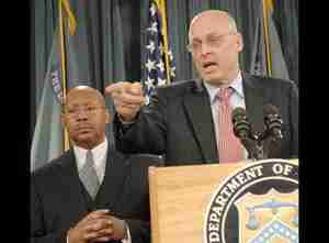 Treasury Secretary Henry Paulson (right) and secretary of housing Alphonso Jackson <font face=Arial size=-2>(Source: Bloomberg)</font>