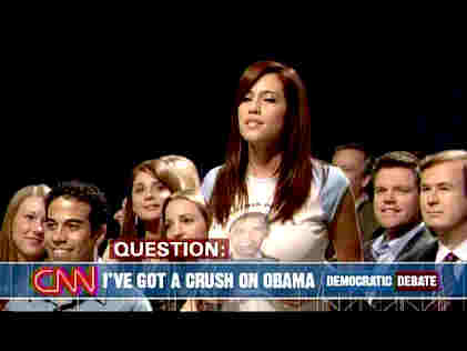 "Obama Girl" is selected as randomly chosen questioner on a <i>Saturday Night Live</i> skit mocking the press's adoration of Barack Obama.  Her "question" turns out to be her song, "I've got a crush on Obama." <font size=-2>(Source: NBC)</font>