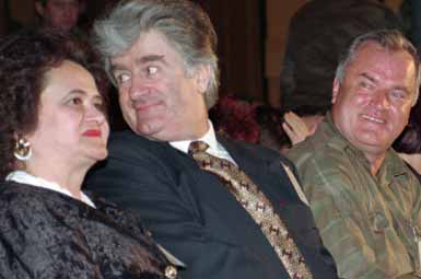 Radovan Karadzic, center, with his wife Ljiljana and Ratko Mladic <font face=Arial size=-2>(Source: Times Online)</font>