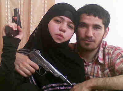 Female suicide bomber Dzhennet Abdurakhmanova and her husband, terrorist Umalat Magomedov. <font face=Arial size=-2>(Source: Moscow Times)</font>