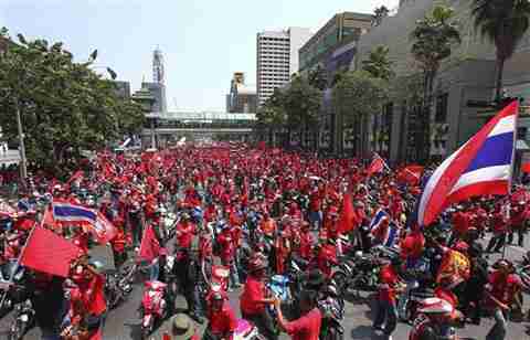 Bangkok Thailand - tens of thousands of red-shirted anti-government demonstrators <font face=Arial size=-2>(Source: VOA)</font>