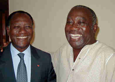 Laurent Gbagbo, right, and Alassane Ouattara in 2000, before they became bloody enemies. (Reuters)