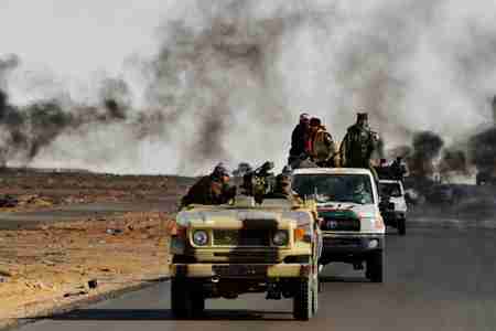 Convoy of rebel fighters in Libya (AFP)