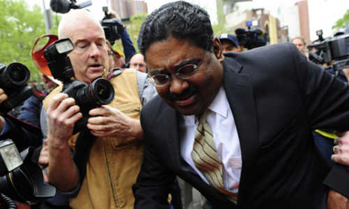 Raj Rajaratnam leaving court after being found guilty (AFP)