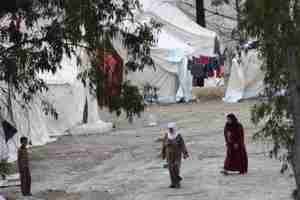 Syrian refugees living in tents in refugee camp in Yayladagi, Turkey (Reuters)