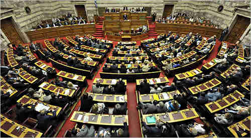 George Papandreou speaking to Athens Parliament on Tuesday (AFP)