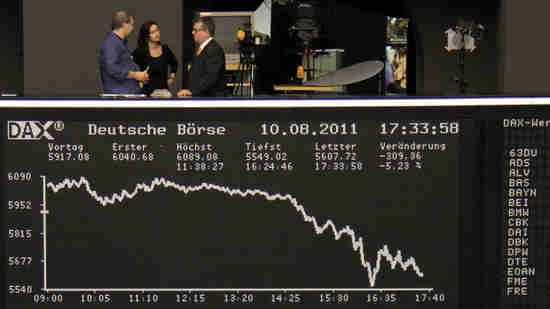 Frankfurt Stock Exchange - people stand in the balcony above the DAX index board on 10-Aug (Reuters)