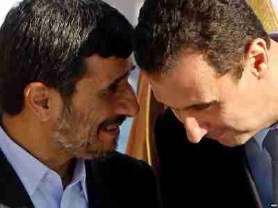 Ahmadinejad conferring with Assad in 2009 (RFERL)