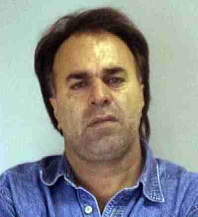 Alleged terrorist Manssor Arbabsiar in booking photo (AP)