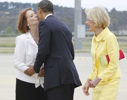 Australian Prime Minister Julia Gillard greets President Obama in Canberra (AP)