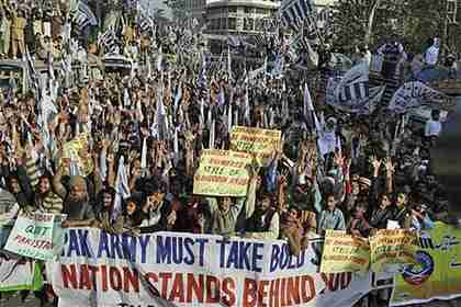 Supporters of a Pakistani religious party rally and condemn Nato, in Lahore on Tuesday (AP)