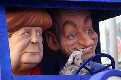 Float mocking Merkel's open support of Sarkozy appearing in a German carnival celebration last month (DPA)