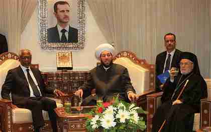  Syrian Grand Mufti Ahmed Hassun (C) and other religious figures meet with Kofi Annan in Damascus (AFP)