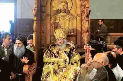 The body of Pope Shenouda III, the head of Egypts Coptic Orthodox Church, is displayed for public viewing inside the Abassiya Cathedral in Cairo, on Sunday (Gulf News)