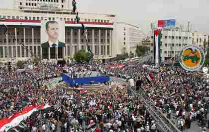 Large pro-Assad rally in Damascus on Saturday (AP)