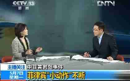 He Jia (left) says that China has 'unquestionable sovereignty' over the Philippines (CCTV)