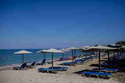 Empty tourist sunbeds on the island of Lesbos (Getty)