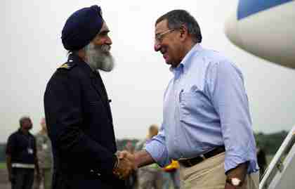 Leon Panetta and Singapore Colonel Sarbjit Singh (Reuters)