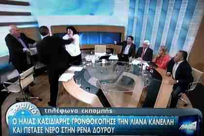 Ilias Kasidiaris slaps Liana Kanelli (in white) on nationwide Greek TV