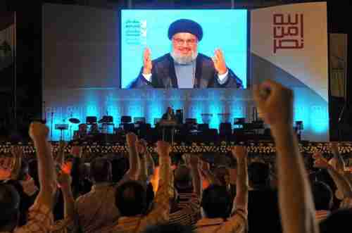 Hizbollah Secretary-General Hassan Nasrallah speaks to enthusiastic supporters (EPA)