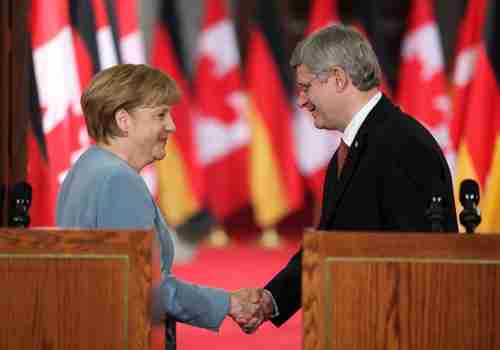 Angela Merkel and Stephen Harper (AP)