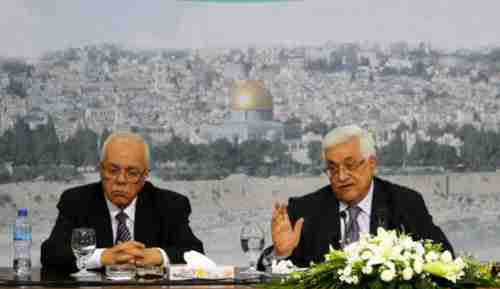 PA President Mahmoud Abbas (R) at press conference in Ramallah on Saturday (AP)