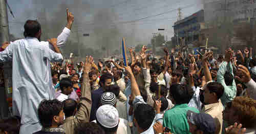 Protesters in Rawalpindi, near Islamabad (AP)