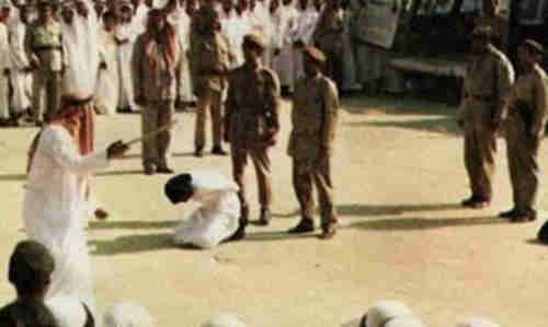 Saudi Swordman prepares to behead convict (Al-Ahram)