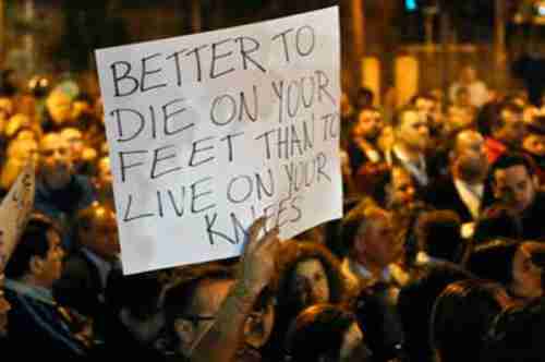 Protesters in Cyprus: 'Better to die on your feet than to live on your knees'