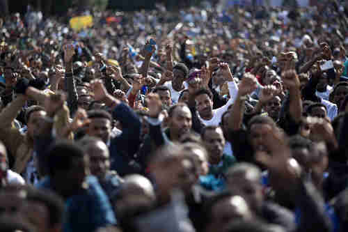 Tens of thousands of migrants protest in Tel Aviv on Sunday and Monday (AP)