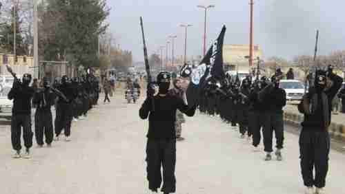 ISIS fighter parade in Syrian town on January 2 (Reuters)