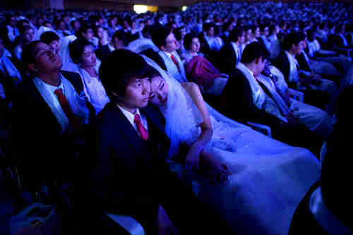 Korean couples prepare for marriage on Wednesday (AFP)