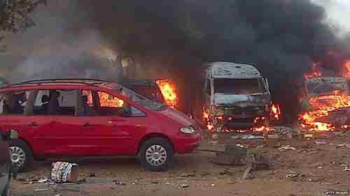 Aftermath of terrorist explosion at bus station in Abuja, Nigeria, on Monday (BBC)