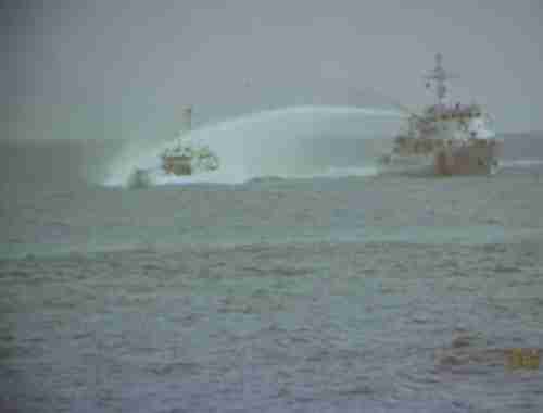 Chinese ship sprays water cannons at smaller Vietnamese ship in May