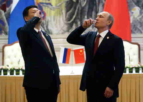 Vladimir Putin and Xi Jinping in Shanghai on Wednesday (Getty)