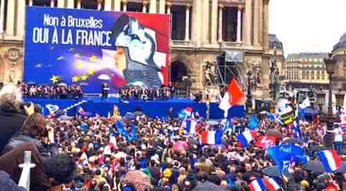 Marine Le Pen rally in Paris. The sign says, 'No to Brussels, yes to France.'