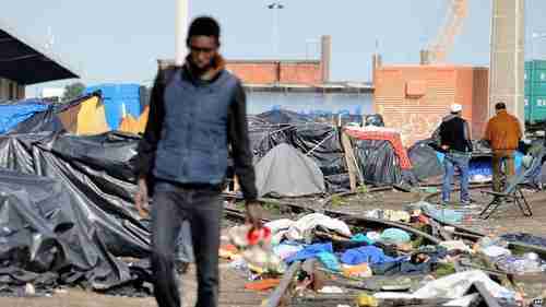 For many of the refugees, all of their belongings were bulldozed into a pile and put into plastic bags (AFP)