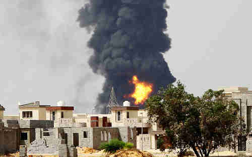 Black smoke rises about Tripoli fuel depot fire (AFP)