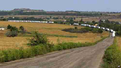 The massive convoy travels in Ukraine towards Luhansk on Friday (AP)