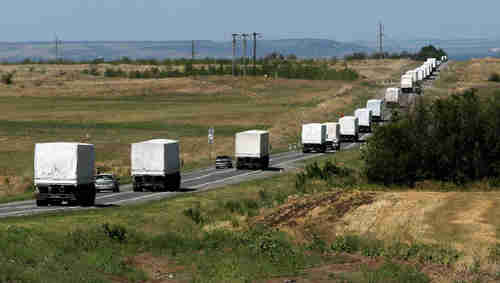 Massive Russian truck convoy with unknown contents arrives in Russian-held territory in east Ukraine, with no permission and no inspections (Ria Novosti)