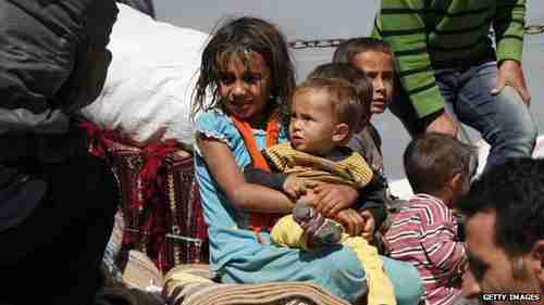 Hundreds of thousands of refugees from Kobani have been pouring into Turkey (Getty)