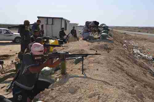 Iraqis fighting ISIS militants on October 25 (Reuters)