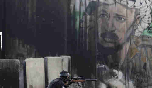 Israeli border policeman shown during clashes with Palestinian protesters in Rmallah on Friday (Reuters)