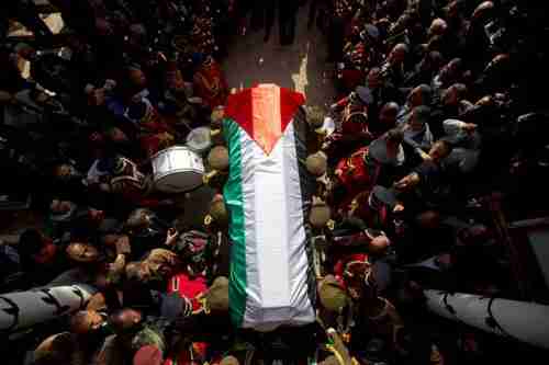 Funeral for Ziad Abu Ain in Ramallah on Thursday (AP)