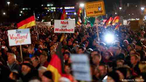 PEGIDA demonstrators in Dresden on Monday (Reuters)