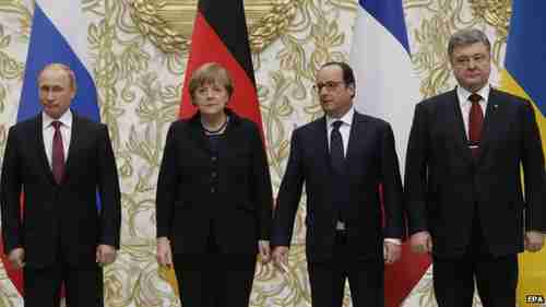 Grim faces in 'family photo' during a break in the negotiations (EPA)